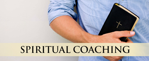 man holding a bible - spiritual coaching